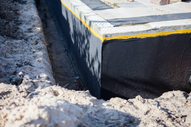 Professional Basement Waterproofing technician working in Niagara University, NY